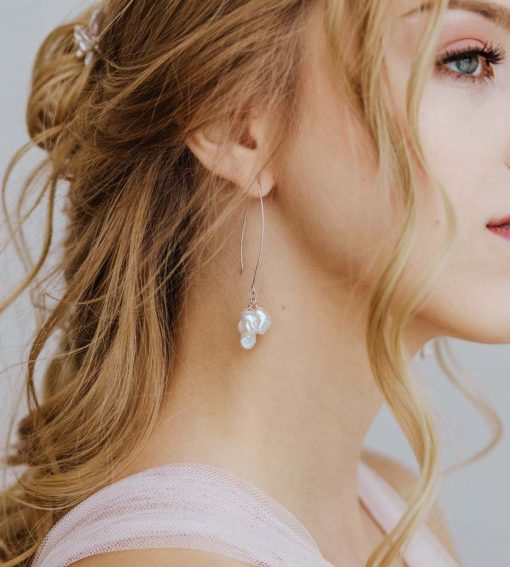 Long dangle pearl cluster earrings handcrafted by Carrie Whelan Designs