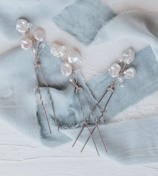 Delicate pearl floral hair pin handcrafted by Carrie Whelan Designs