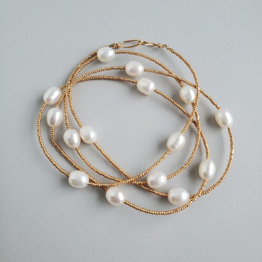 Long freshwater pearl gold seed bead necklace handcrafted by Carrie Whelan Designs