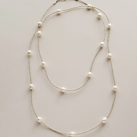 Long freshwater pearl strand necklace handmade by Carrie Whelan Designs