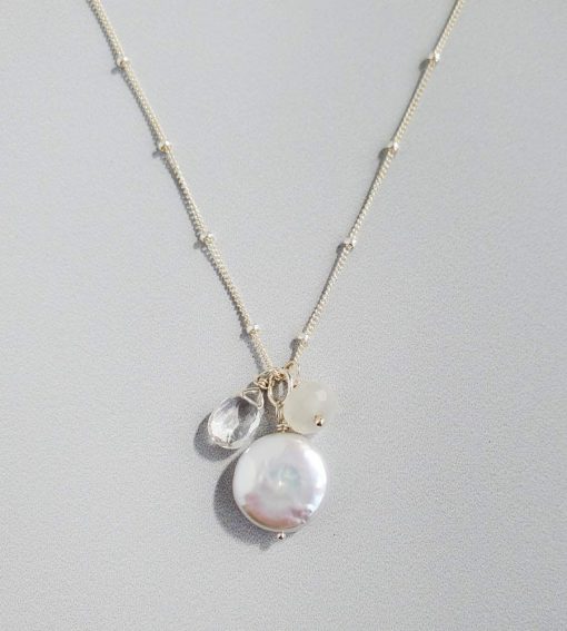 Coin pearl and moonstone cluster pendant in sterling silver handcrafted by Carrie Whelan Designs