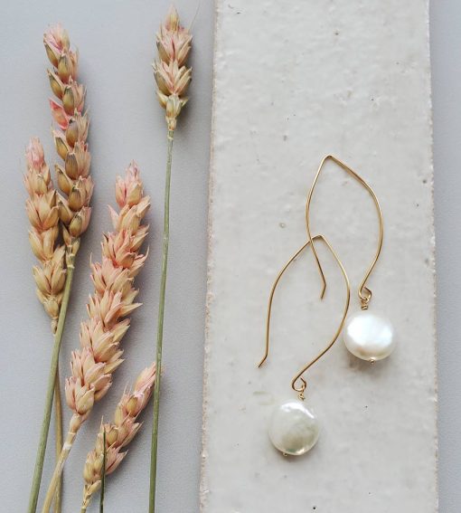 Long dangle coin pearl earrings in 14kt gold fill handcrafted by Carrie Whelan Designs