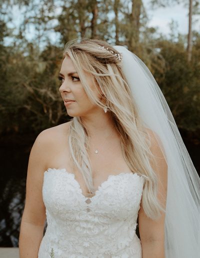 Handcrafted pearl cluster bridal earrings on real bride Amy from Carrie Whelan Designs