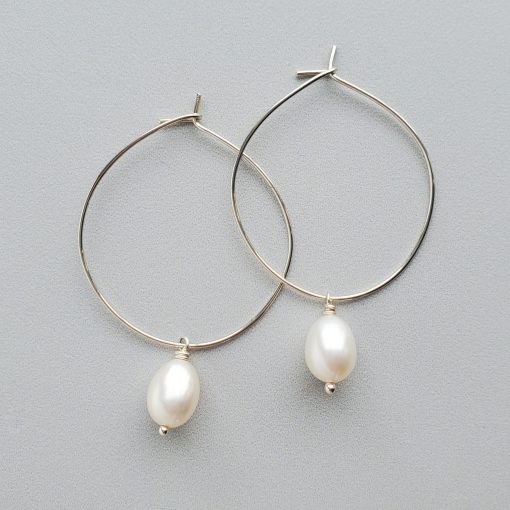 Pearl drop hoop earrings in silver by Carrie Whelan Designs