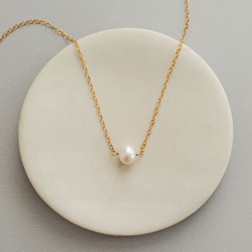 Pearl choker necklace in gold handmade by Carrie Whelan Designs