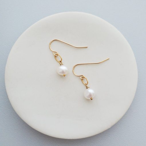 Small pearl earrings in gold handmade by Carrie Whelan Designs