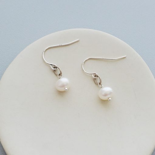 Small pearl earrings in silver by Carrie Whelan Designs