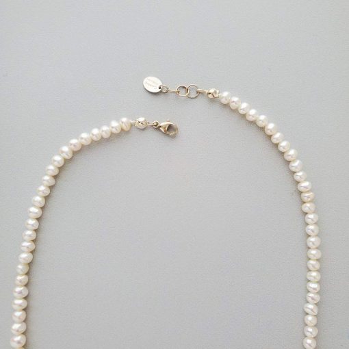 Small pearl necklace with lobster clasp by Carrie Whelan Designs