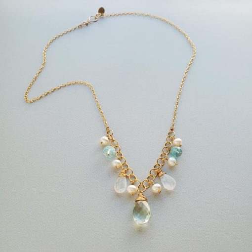 Handmade Pearl and gem necklace in gold by Carrie Whelan